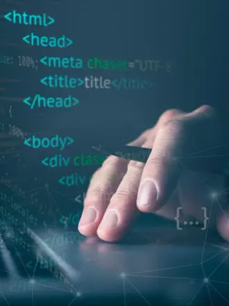 zdjęcie przedstawiające ręczne pisanie kodu strony internetowej